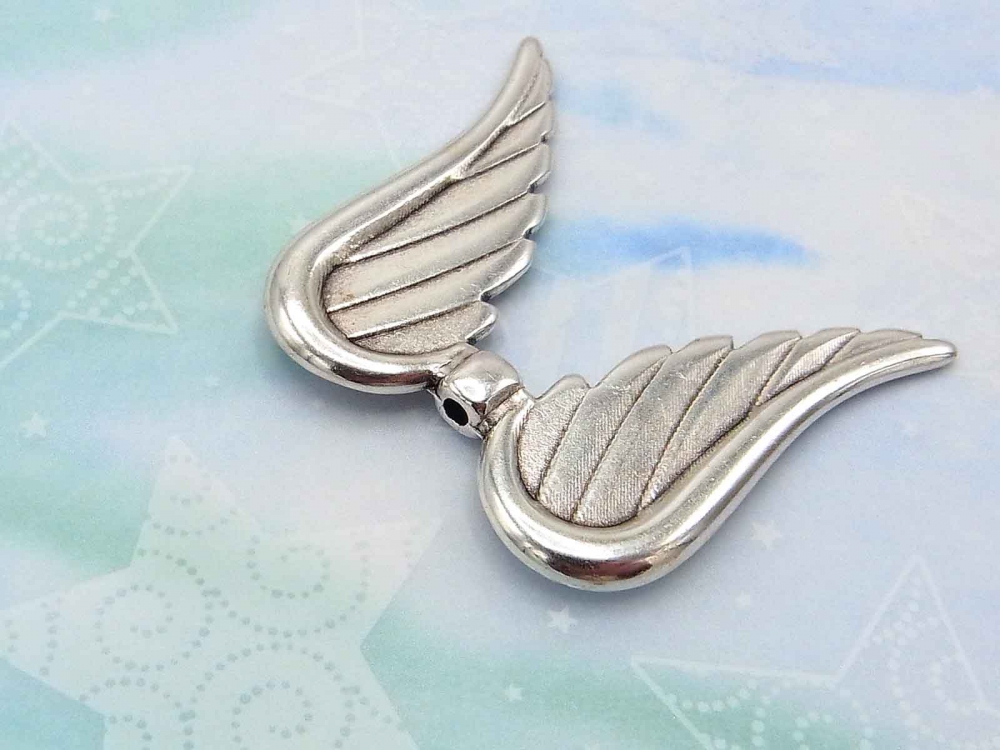 Flügelpaar, große Flügel, 39 mm, versilbert<br />2,40 €